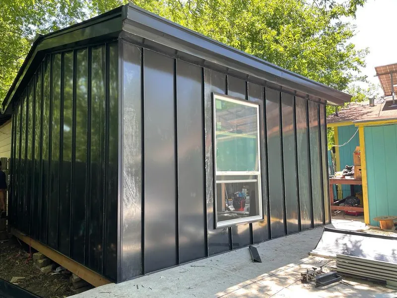 Black standing seam metal wall panels for Metal Roof Installation in Mustang