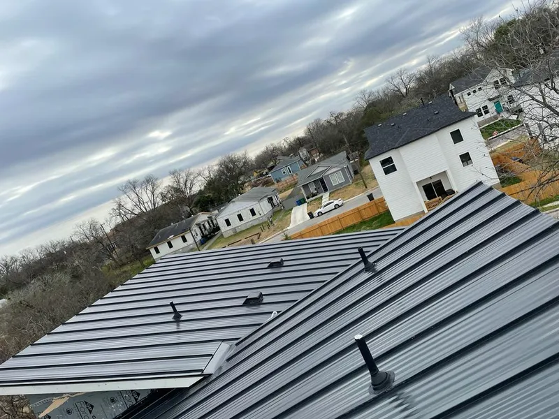 Standing seam metal roof panels with vents for Skylight Repair in Mustang